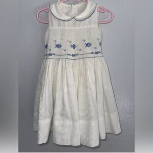 Monica Noel  white smocked toddler dress in size 2T.